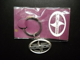 Scion Key Chain Heavy Steel Colored Metal Car Logo with Black Print - £6.38 GBP