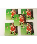 5 VINTAGE COCA COLA CORK COASTERS CHRISTMAS SANTA CLAUS SHUSHING DOG - $4.74 CAD