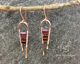 Handmade copper earrings: long curves with metallic and red rectangle beads - £21.50 GBP