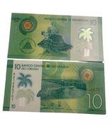 2015 Nicaragua 10 Córdobas Polymer Note Dancer &amp; Palm Tree UNC - $4.93 CAD
