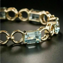 10Ct Emerald Cut Simulated Aquamarine Tennis Bracelet 14K Yellow Gold Plated - £247.25 GBP