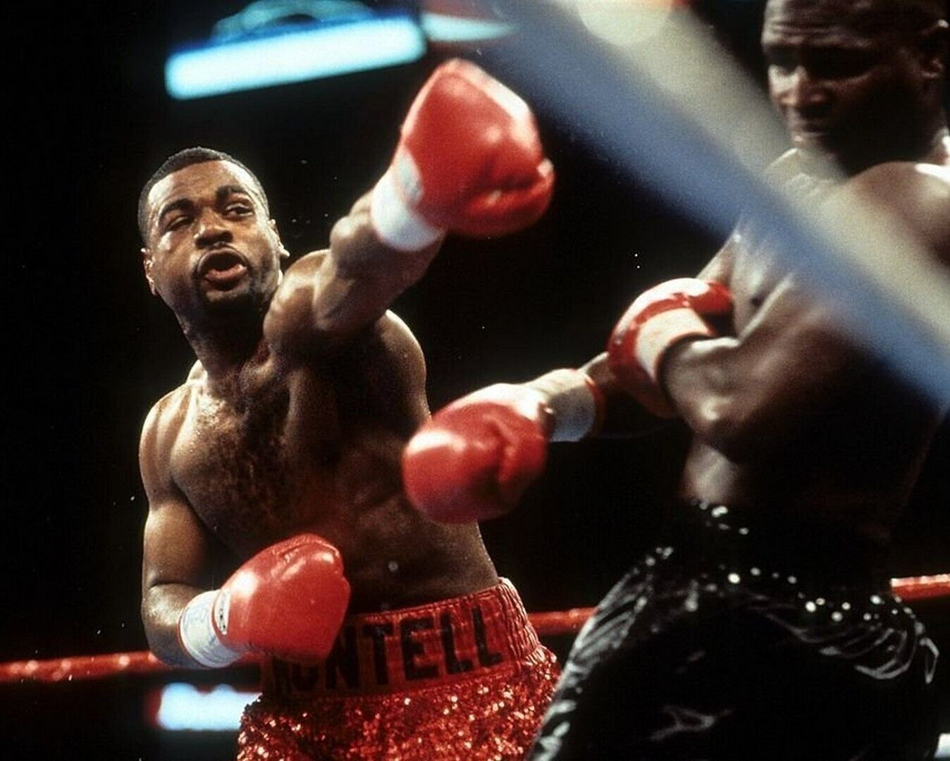 Primary image for MONTELL GRIFFIN 8X10 PHOTO BOXING PICTURE ATTACKING