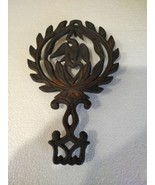 Vintage Cast Iron Trivet Eagle and Heart Wreath Footed Farmhouse Decor - $10.05