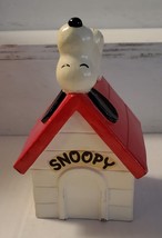 Vintage Peanuts Snoopy lying on doghouse bank coin box - Determined 7&quot; tall - $15.99