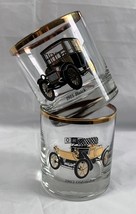 2 Classic Car Cocktail Gold Rimmed Glasses 1915 Buick 1903 Oldsmobile - £22.51 GBP