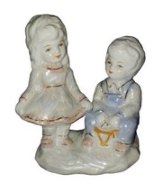 Vintage Blue Ceramic Figurine Girl and Boy Playing Drum Gold trim Colonial - $15.00