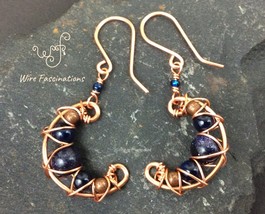 Handmade blue goldstone earrings: criss cross copper wire wrapped crescent moons - £23.62 GBP