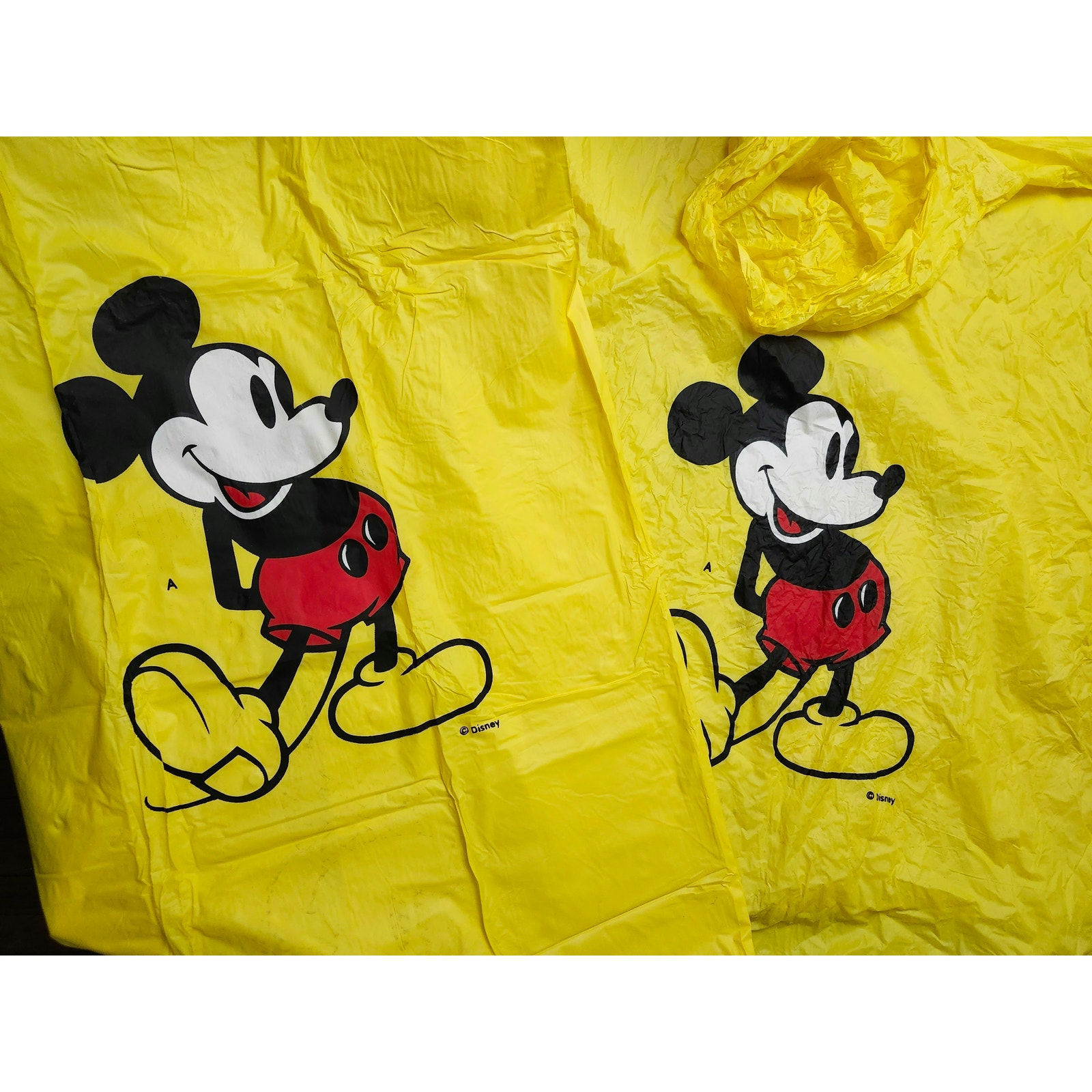 Primary image for Lot 2 Vintage Mickey Disney Yellow Ponchos Adult Sized Snap Button Sides