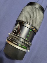 The Zuiko/Olympus 35-105 zoom lens.C.1985 - $35.00