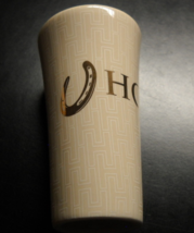 Horseshoe Casino Shot Glass Tall Flared Style and Size Cream Ceramic Gold Print - £6.26 GBP