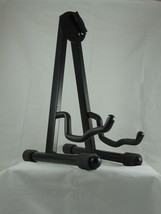 Folding compact guitar stand adjustable black padded - $316.43 MXN