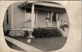 RPPC Michigan Porch Sittin Family Cute Dog in Yard c1915 Postcard U6 - £7.94 GBP