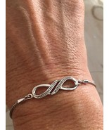 Diamond Accent Infinity Bolo Bracelet in Sterling Silver - 9.5&quot; adjustable - $123.02 CAD