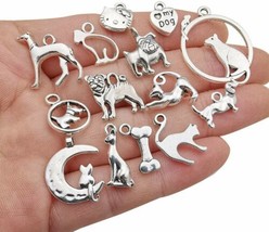 10 Dog Charms Cat Pendants Assorted Charms Lot Paw Print Antiqued Silver... - $5.69