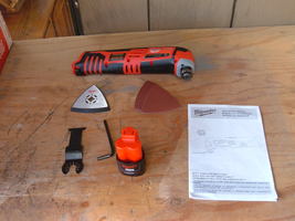Milwaukee M12 2426-20 Multi-tool with a few accs. and a 1.5ah Redlithium... - $86.00
