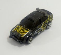Vintage 2004 Hot Wheels Ford Escort Rally Tiki Torchers Tiger Stripes 1:64 - €2,16 EUR