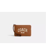 NWT COACH Corner Zip Wristlet With Varsity Light Saddle - $54.95