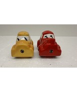 Magnetic Cars Ceramic Salt &amp; Pepper Shakers Red &amp; Yellow Car Set - $19.57 CAD