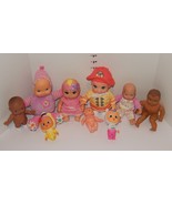 Huge lot of 9 different size Dolls Pink Yellow Purple - $453.77 MXN