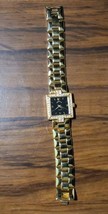 Adrienne Vittadini watch Gold tone w/diamonds around Square face - $12.86