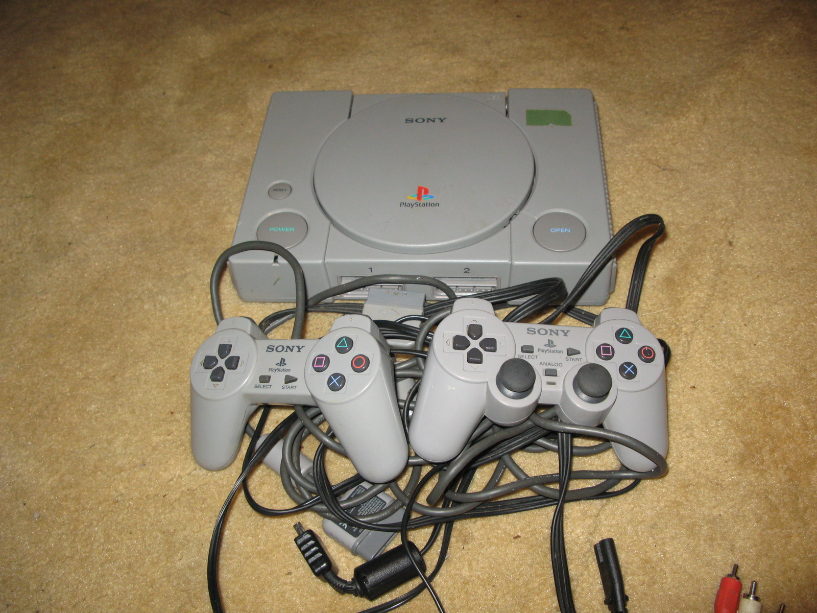 Original Gray Playstation Game Console and Controllers - $100.00