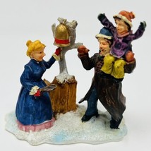 Vintage Christmas Holiday Figurine Happy Village Family Ringing Bell Rite Aid - £9.98 GBP