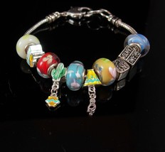 Tourist Charm Bracelet Indian head Grand canyon Kokopelli Kachina Dancer Memorie - $60.00