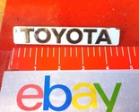 84 1988 Toyota Corolla Rear Emblem White/Chrome Original Equipment Manuf... - $22.49