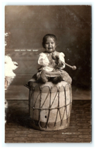 New Mexico NM Tesuque Pueblo Indian RPPC Ameliana Baby Sitting On Drum - £69.71 GBP