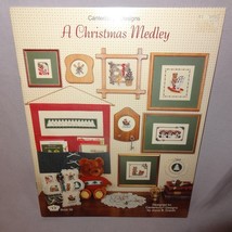Christmas Medley Counted Cross Stitch Pattern Leaflet Book 36  1985 Puppies Cat  - $9.89
