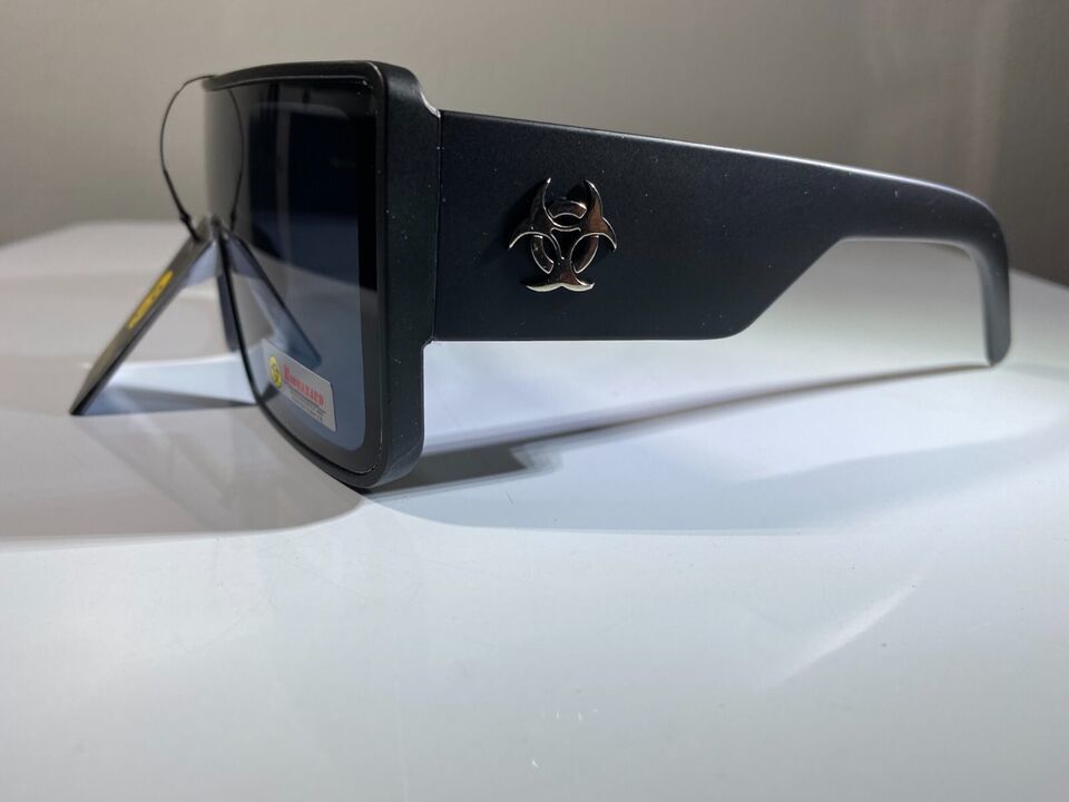 Unisex, futuristic style sunglasses with black frame and smoke black lenses - $9.50