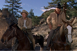 John Wayne and Glen Campbell in True Grit on horseback together 18x24 Poster - $23.99