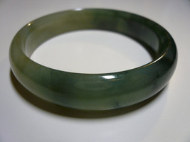 An Oily Green Jadeite Jade Bangle (Grade A) - £1,023.84 GBP