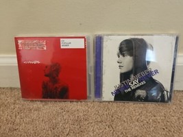 Lot of 2 Justin Bieber CDs: Changes (Ex-Library), Never Say Never Remixes - £6.71 GBP