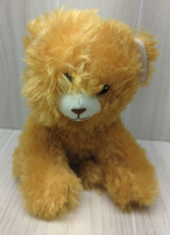 Greenbrier International Plush orangish brown teddy bear sitting white s... - $4.94