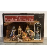Nativity Set 11 Piece Porcelain 1 Wooden Manger 10 Porcelain Figurines w... - $42.21 CAD