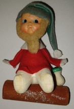 Vintage Flocked Elf on Log Ornament Japan Rubber Face - $20.00