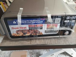 Ninja Foodi 11-In-1 Dual Heat Air Fry Oven FT301 open box SMALL DENT - $217.80