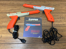 Nintendo Zapper Light Gun Orange Lot Of 2 Plus Manual Untested CV - £17.03 GBP