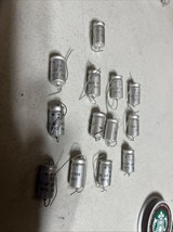 Lot Of 13 T.I 100  25VDC  Electrolytic Capacitors 85C 7637 - $42.08