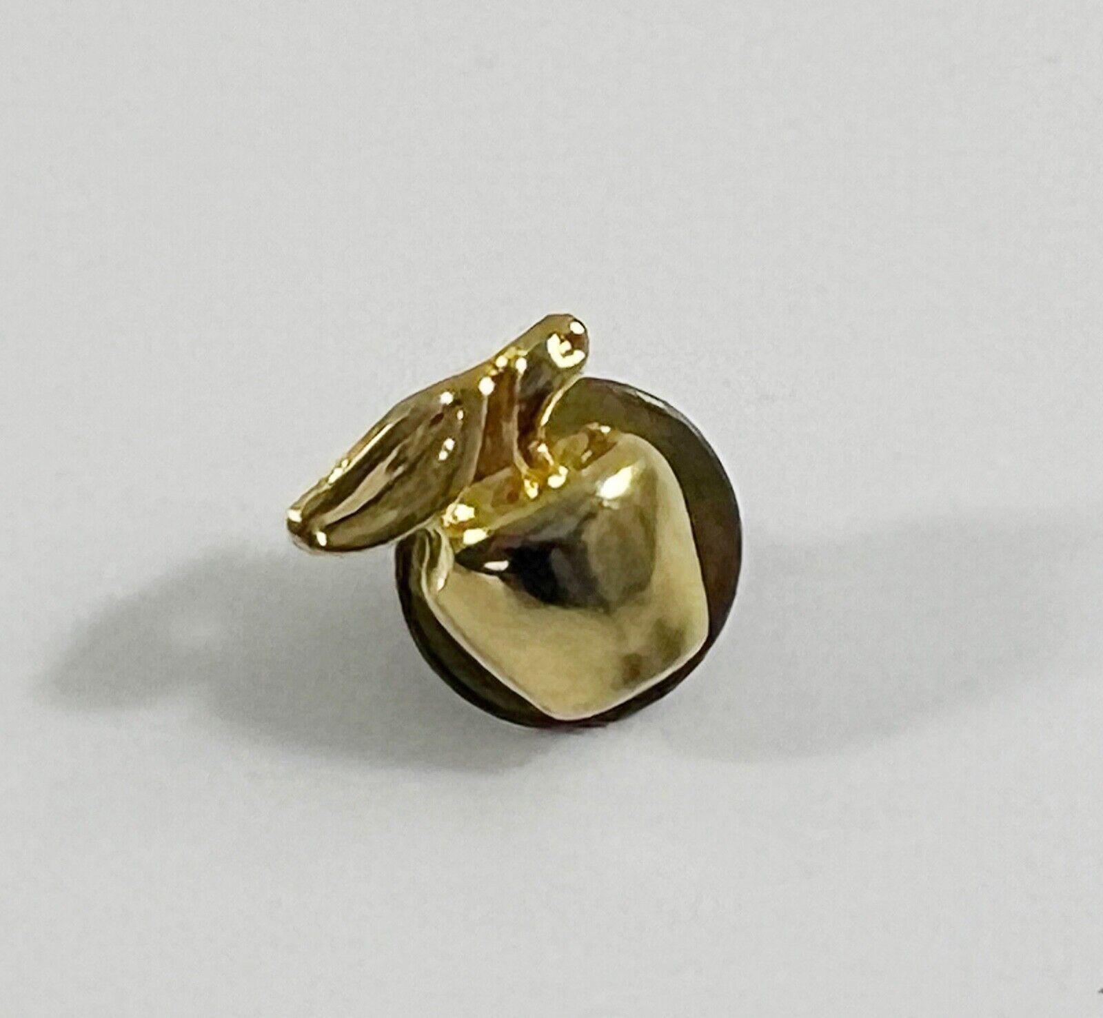 Dainty Gold Tone Apple Lapel Pin - $9.89