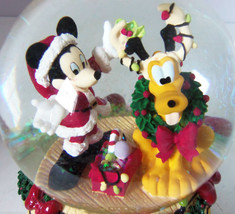 Disney Mickey Mouse Pluto Musical Snowglobe Christmas Holiday Deck the H... - $49.95