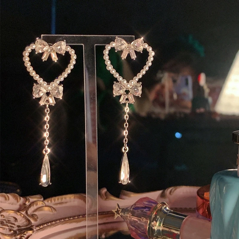 Korean Sweet Pearl Hollow Heart Drop Earrings For Women Girls Fashion Bowknot Cr - £11.25 GBP