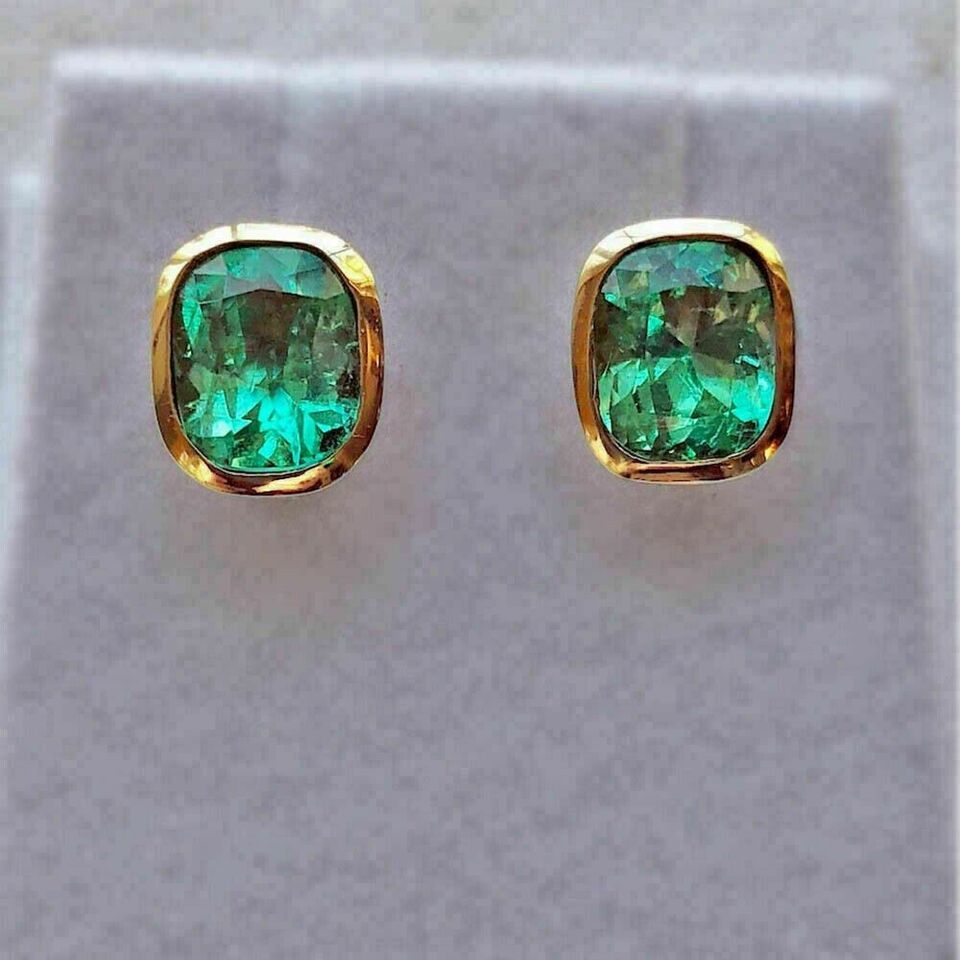 Primary image for 2Ct Oval Simulated Green Emerald Bezel Set Stud Earrings 14K Yellow Gold Plated