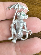 Vintage Silver-Tone Monkey w/ Umbrella Green Rhinestone Eyes Metal Brooc... - $14.03
