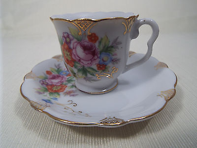 Primary image for Ucagco Occupied Japan Demitasse Cup and Saucer Multi Floral with Gold Trim