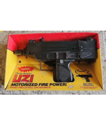 VINTAGE 1986 MOTORIZED UZI CARBINE AUTOMATIC CAP GUN TOY NOS NIB ORIGINAL - $99.54