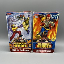 Lot of 2 Rescue Heroes VHS Tapes Electrical Storm 2000 &amp; Peril on the Pe... - £7.11 GBP