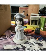 The “Precious Moments — The Lord Is The Hope Of Our Future” figurine (No... - $27.84 CAD