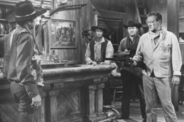 John Wayne in Rio Bravo 24x18 Poster Pointing Rifle in Bar - £18.05 GBP